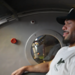 Patient relaxing in a hyperbaric oxygen chamber to support healing and recovery after surgery.