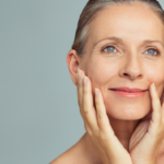 Beautiful mature woman with healthy skin illustrating the difference between collagen and elastin and healthy skin aging.